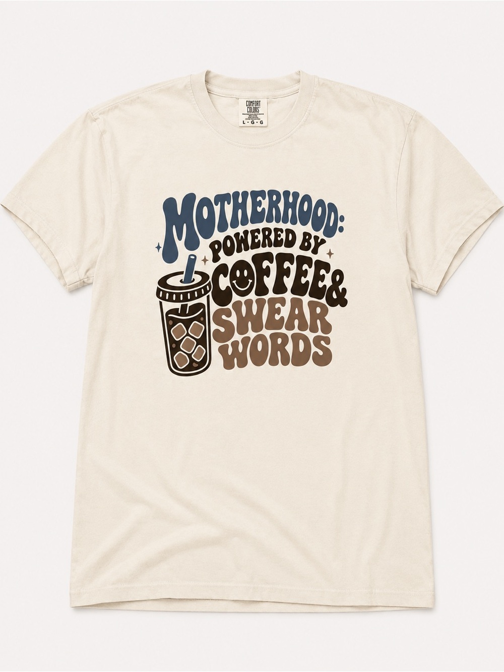 "Motherhood: Powered by Coffee & Swear Words" graphic tee. Comfort colors ivory